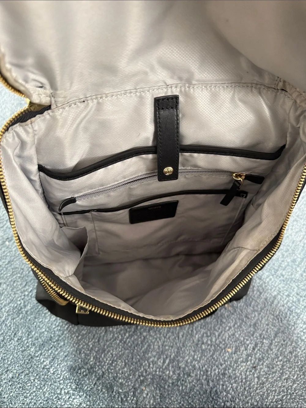 Tumi Black Nylon Backpack with Gold Zippers